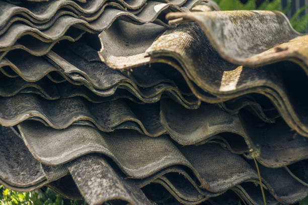 Pieces Of Gray Slate Background Environmental Pollution Golden beach asbestos removal